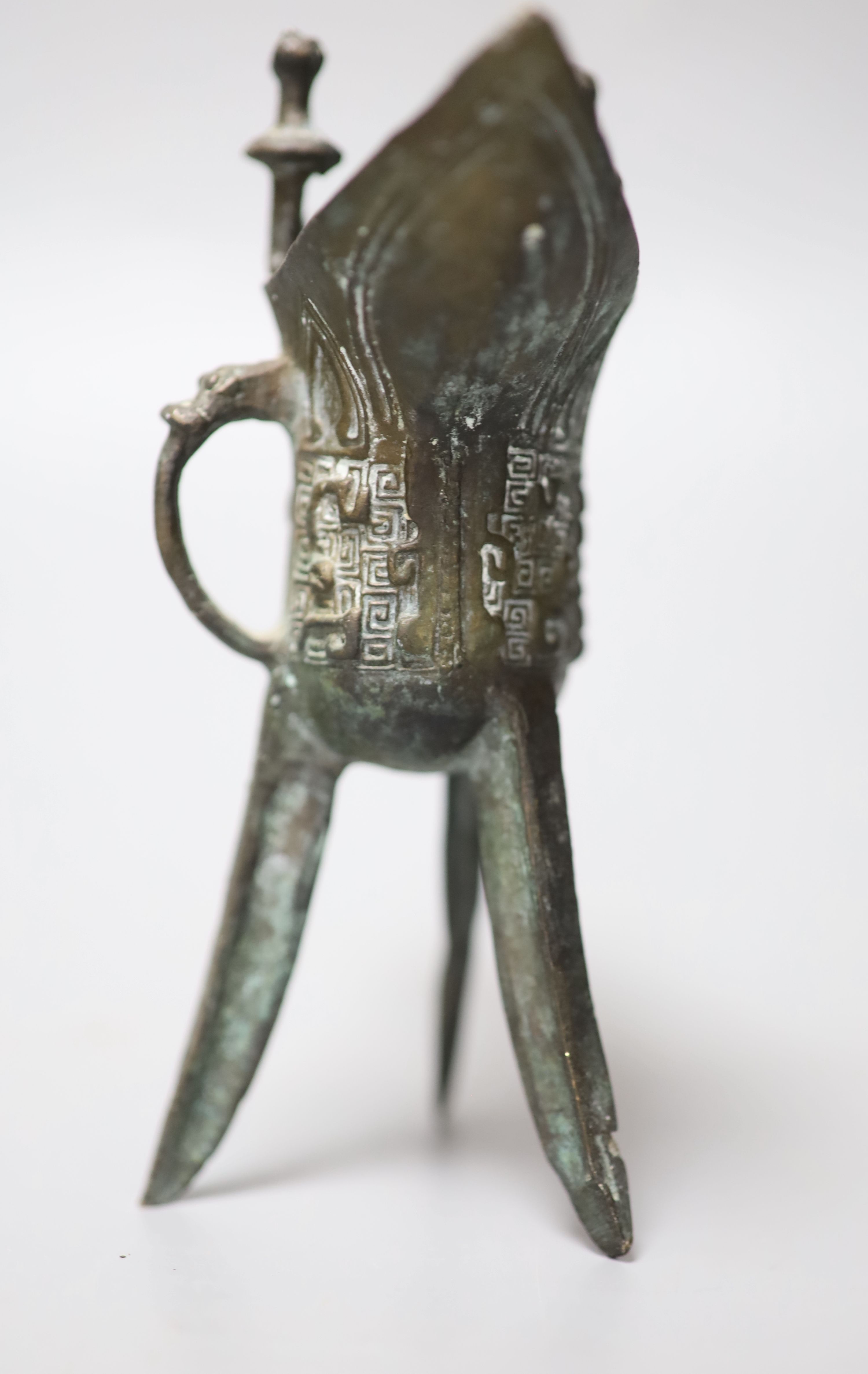 A hardstone censer, a Chinese bronze deity and a bronze jue, tallest 13cm,